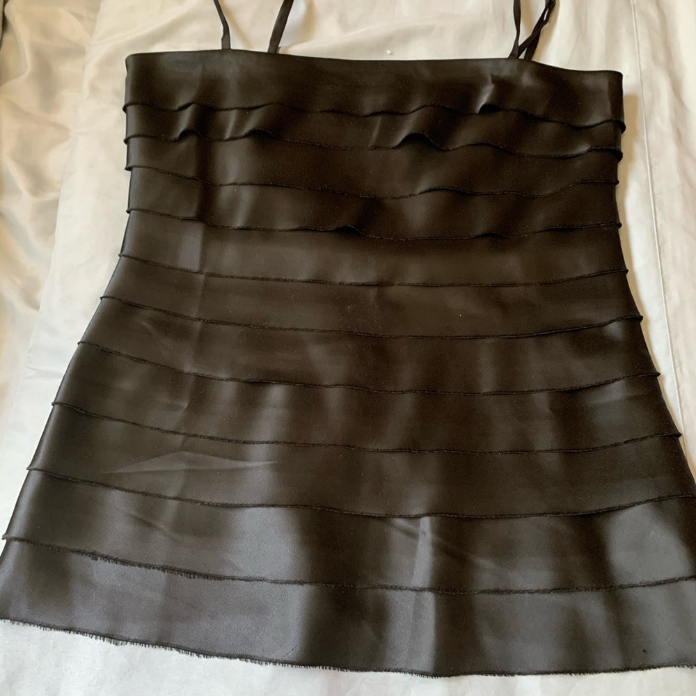 Satin black top.